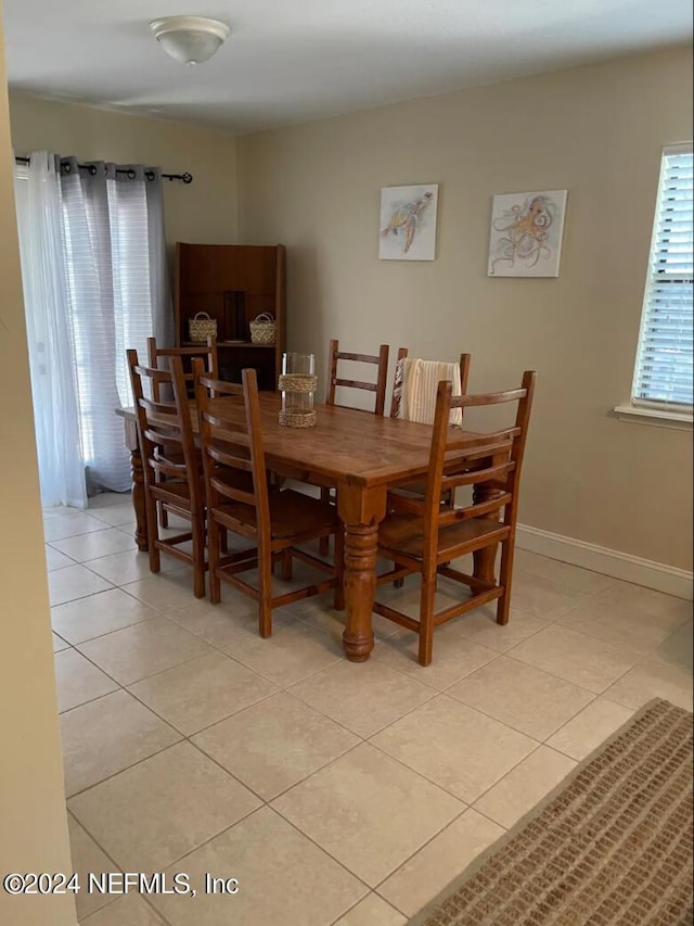 view of tiled dining space