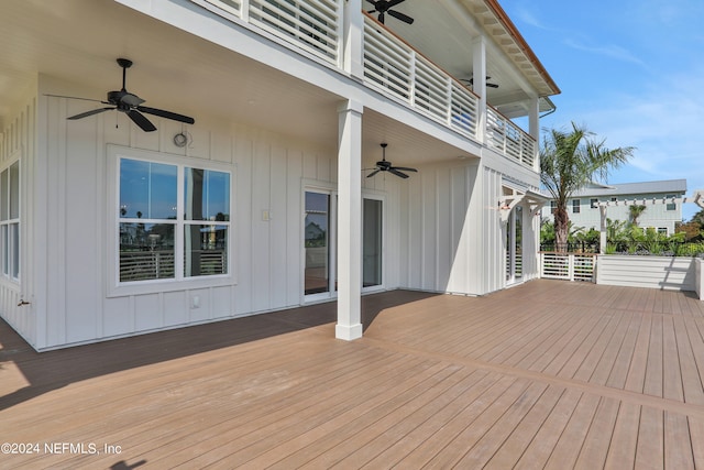 wooden deck with ceiling fan