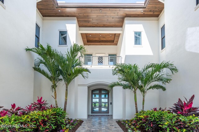 doorway to property featuring french doors