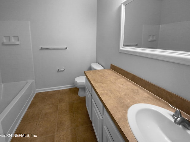 bathroom with toilet and vanity