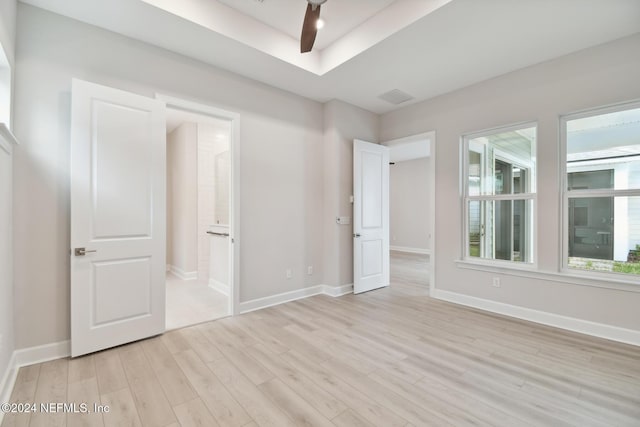 interior space with light hardwood / wood-style floors and ceiling fan