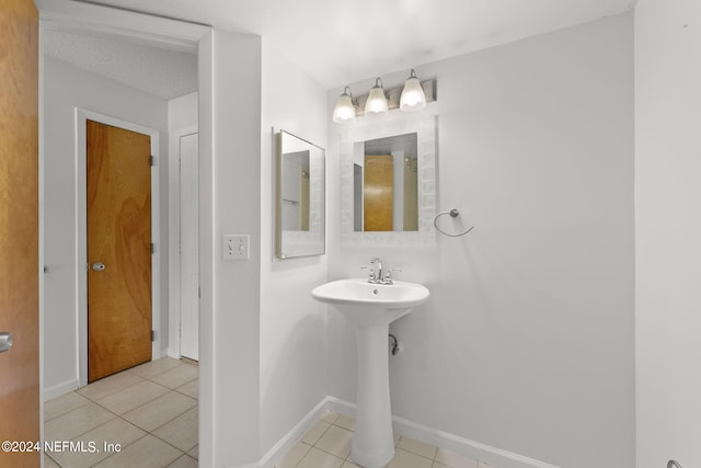 bathroom with tile patterned flooring