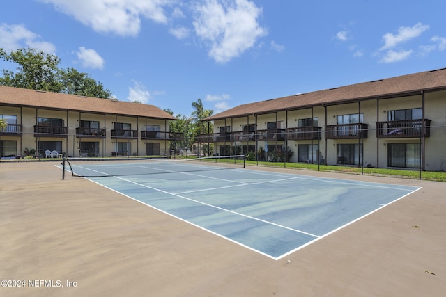 view of tennis court with basketball court