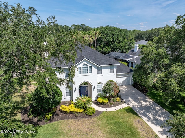 view of front of home featuring a front yard