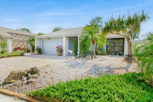 ranch-style house featuring a garage