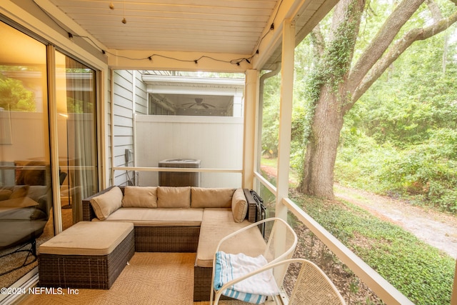 sunroom / solarium featuring plenty of natural light