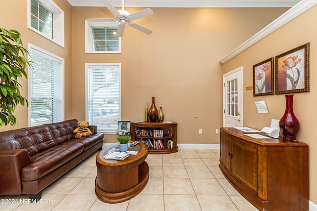 tiled living room with ceiling fan and ornamental molding