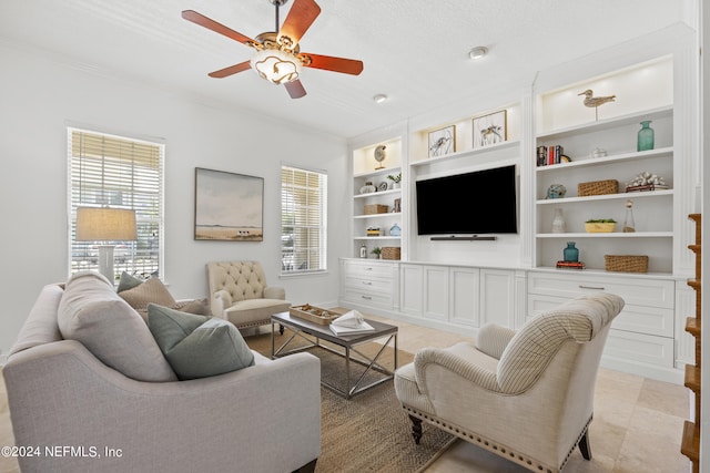 tiled living room with built in shelves, ceiling fan, crown molding, and a textured ceiling