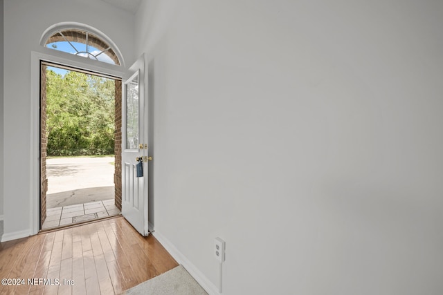 entryway with light hardwood / wood-style flooring