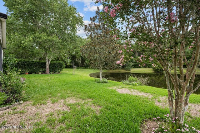 view of yard with a water view