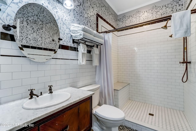 bathroom with toilet, vanity, tile walls, and walk in shower