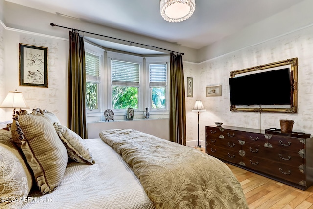 bedroom with light hardwood / wood-style floors