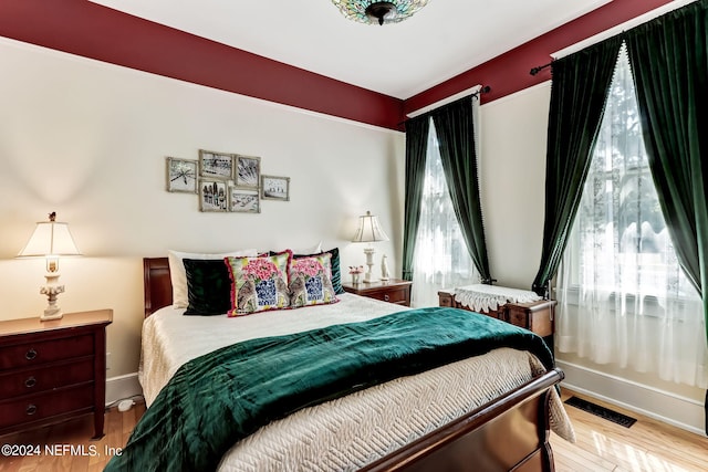 bedroom featuring light wood-type flooring