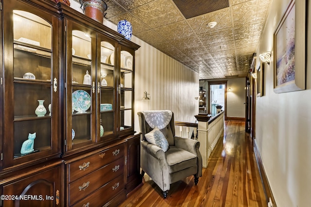 corridor with dark wood-type flooring