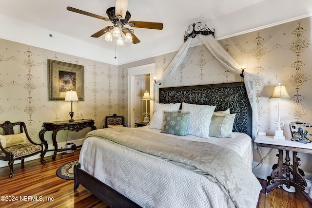 bedroom featuring ceiling fan and wood-type flooring