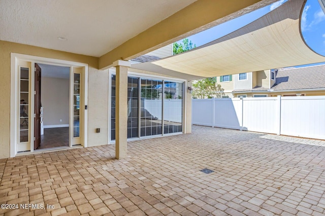 view of patio / terrace with fence