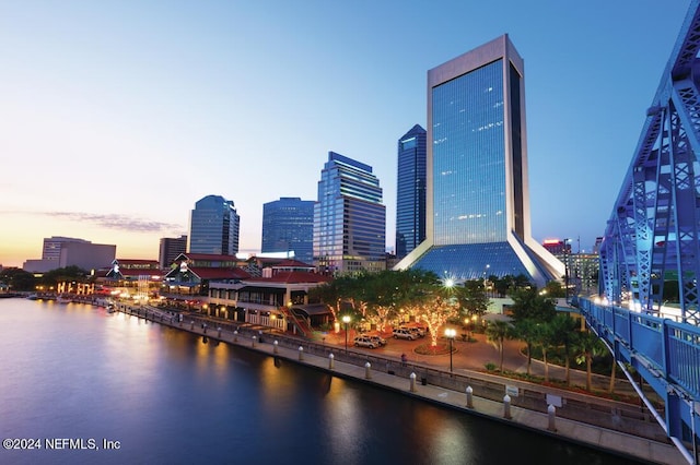 property's view of city with a water view