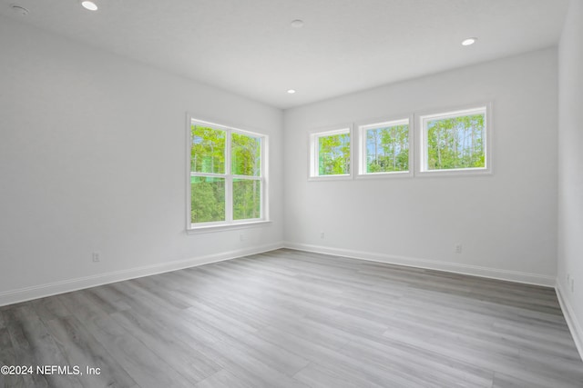 spare room featuring hardwood / wood-style floors