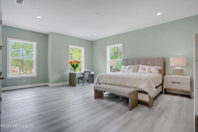 bedroom featuring light wood-type flooring