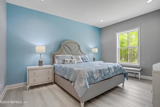 bedroom with light wood-type flooring