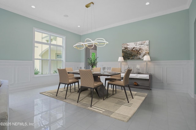 432 Aj Mills Rd, Ponte Vedra, FL 32081 - dining space featuring a decorative wall, a wainscoted wall, ornamental molding, and recessed lighting