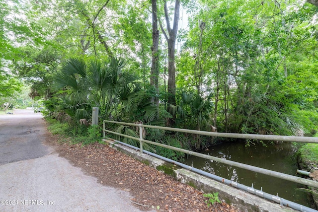 view of road with a water view