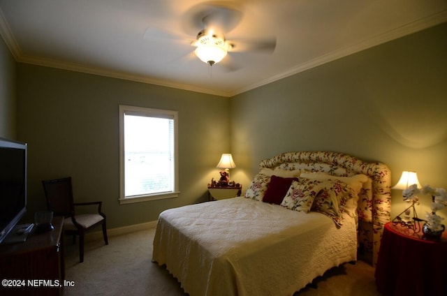 bedroom with ceiling fan, crown molding, and carpet flooring