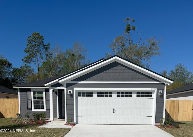 ranch-style home with a garage