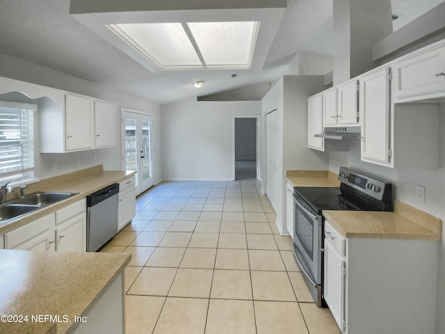 kitchen featuring sink, stainless steel appliances, and white cabinetry