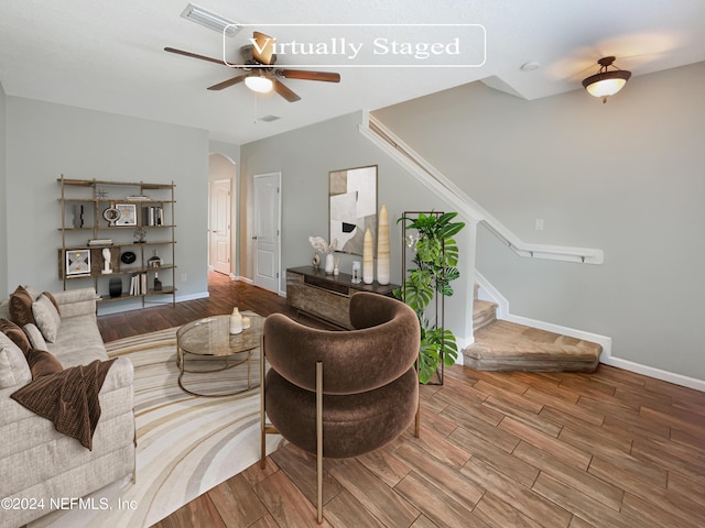 living room with ceiling fan