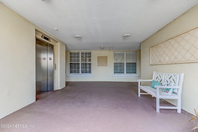 view of patio / terrace with elevator