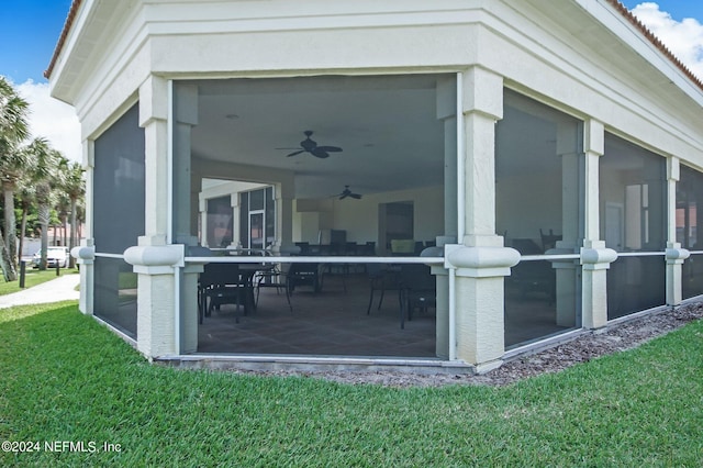 view of patio / terrace featuring a sunroom