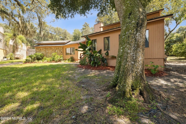 exterior space with a lawn