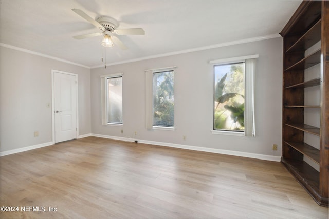 empty room with crown molding, ceiling fan, and light hardwood / wood-style floors