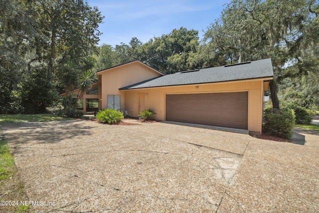 view of front of home with a garage