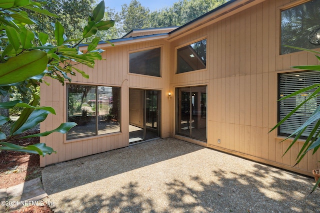 back of house featuring a patio area