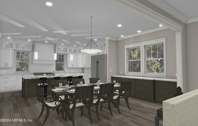 dining space featuring crown molding and dark wood-type flooring