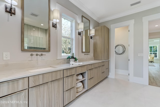 bathroom featuring tile flooring, double sink vanity, and ornamental molding