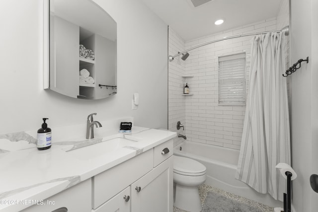 full bathroom featuring vanity, shower / bathtub combination with curtain, and toilet