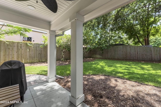 view of patio / terrace with a grill and ceiling fan