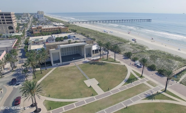 bird's eye view featuring a water view and a view of the beach