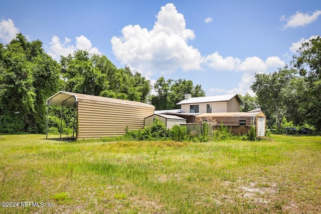 view of yard featuring a carport