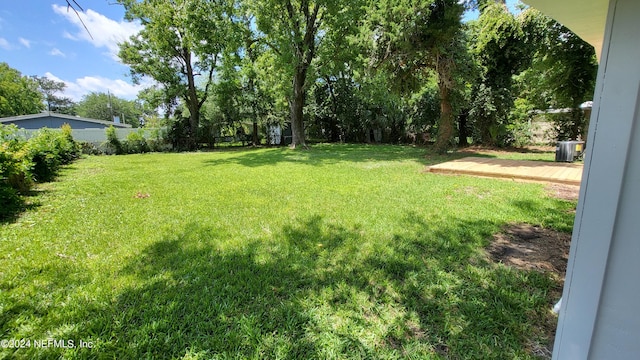 view of yard with a deck