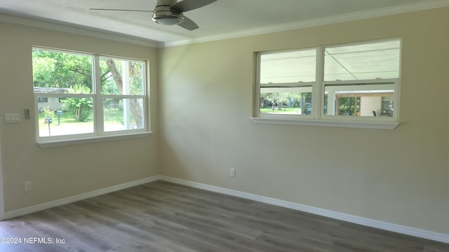 spare room with ceiling fan, ornamental molding, and hardwood / wood-style flooring