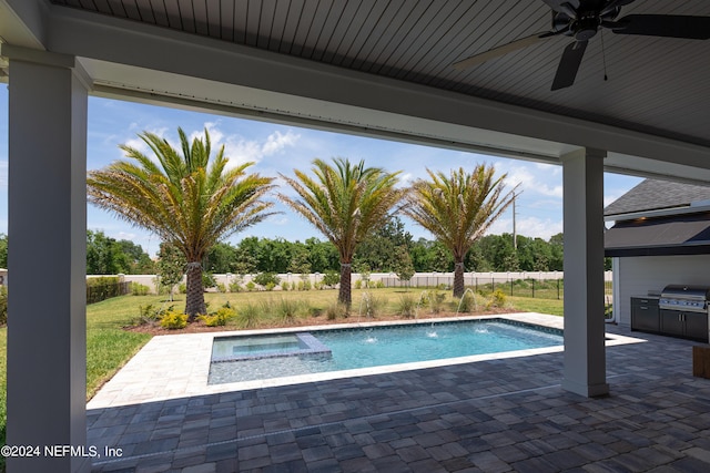 view of swimming pool with ceiling fan, a grill, an in ground hot tub, and a patio