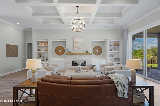 living room featuring ornamental molding, coffered ceiling, beam ceiling, hardwood / wood-style floors, and a stone fireplace