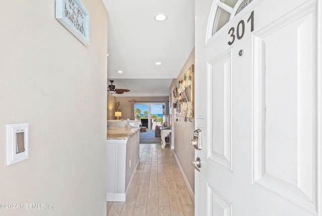 corridor featuring light hardwood / wood-style flooring