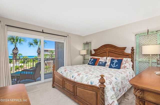 carpeted bedroom with access to exterior