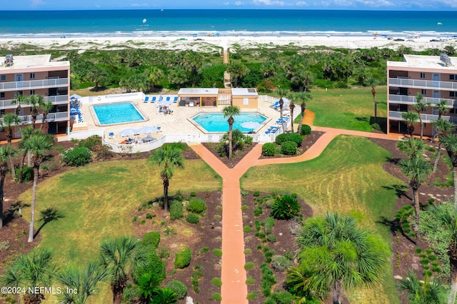 aerial view featuring a water view and a view of the beach