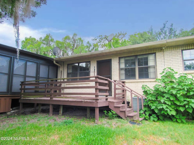 exterior space featuring a wooden deck